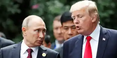 US President Donald Trump and Russian President Vladimir Putin met at the APEC summit in Vietnam in 2017. Jorge Silva/Reuters