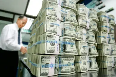 Обналичили до миллиарда долларов. Спецоперация КНБ пресекла деятельность преступников