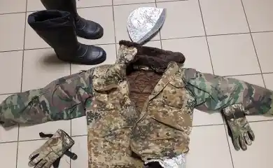 Оригинал: узбек пересек границу задом наперед в одежде из фольги