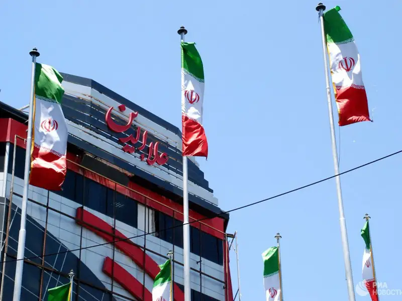 Флаги Ирана на одной из улиц Тегерана. РИА Новости